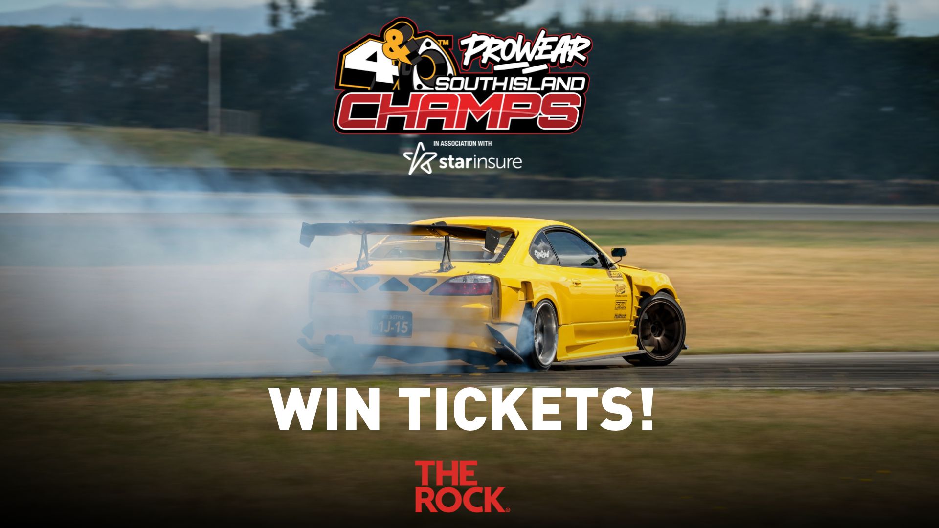 A yellow drift car produces thick smoke on a race track, with event logos "4 & Prowear South Island Champs," "starinsure," "WIN TICKETS!", and "THE ROCK" visible.