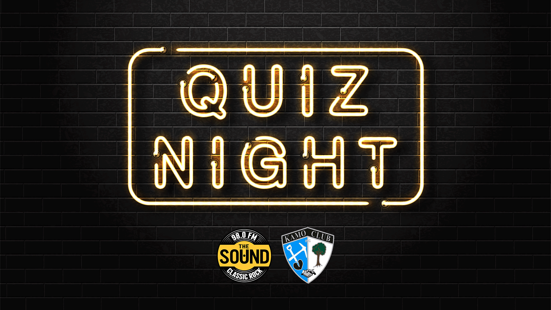 A neon sign on a black brick wall reads "QUIZ NIGHT" with "98.0 FM THE SOUND CLASSIC ROCK" and "KAMO CLUB" logos below.