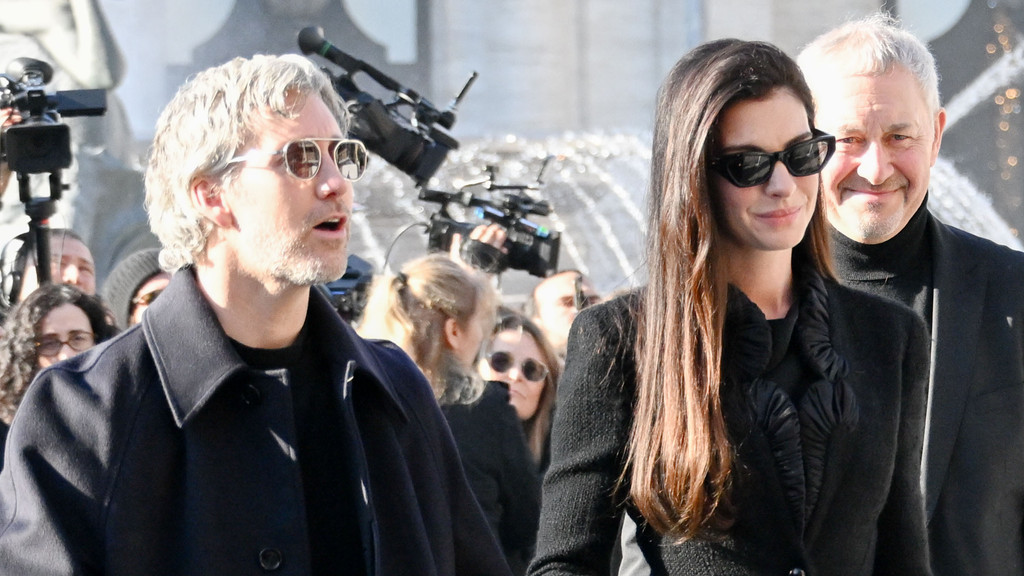 Anne Hathaway and Elizabeth Hurley lead mourners at Valentino's funeral
