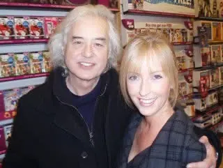 Jimmy Page and Tracey Donaldson smiling in a Gaming shop