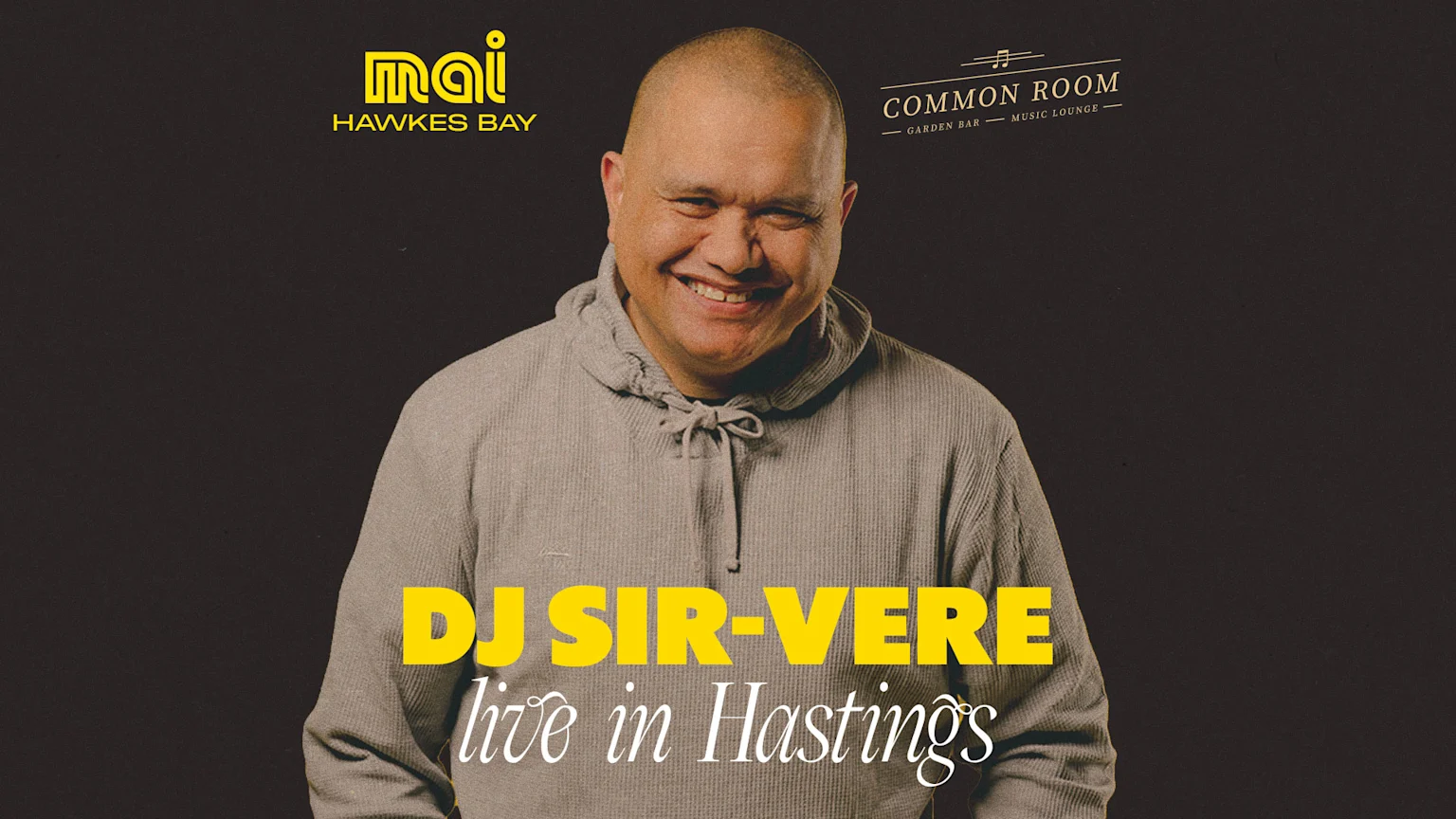 A smiling man in a grey hoodie, identified as DJ Sir-Vere, is centered on a dark background with text "DJ SIR-VERE live in Hastings" at the bottom, and logos for "MAI HAWKES BAY" and "COMMON ROOM" at the top.