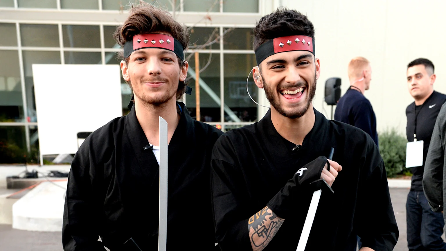 Louis Tomlinson (L) and Zayn Malik on set during One Direction celebrates 1D Day at YouTube Space LA, a 7-hour livestream event broadcast exclusively on YouTube and Google+. Featuring behind the scenes footage, Guinness world record attempts, and amazing special guests, the global event also marked the premiere of tracks from their new album 'Midnight Memories', set for release November 25th, in Playa Vista, California on November 23, 2013 (Photo by Jeff Kravitz/FilmMagic)