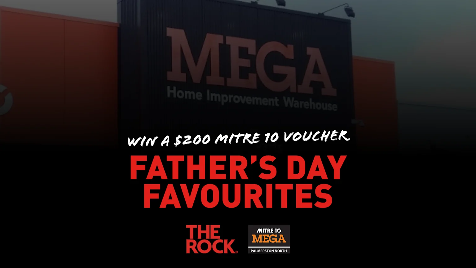 A dark promotional image featuring text "WIN A $200 MITRE 10 VOUCHER FATHER'S DAY FAVOURITES" in white and red, overlaid on a blurry Mitre 10 MEGA store, with The Rock and Mitre 10 MEGA logos.