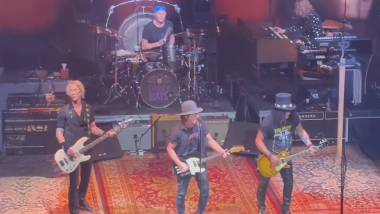 Duff Mckagan, Chad Smith, Eddie Vedder and Slash onstage