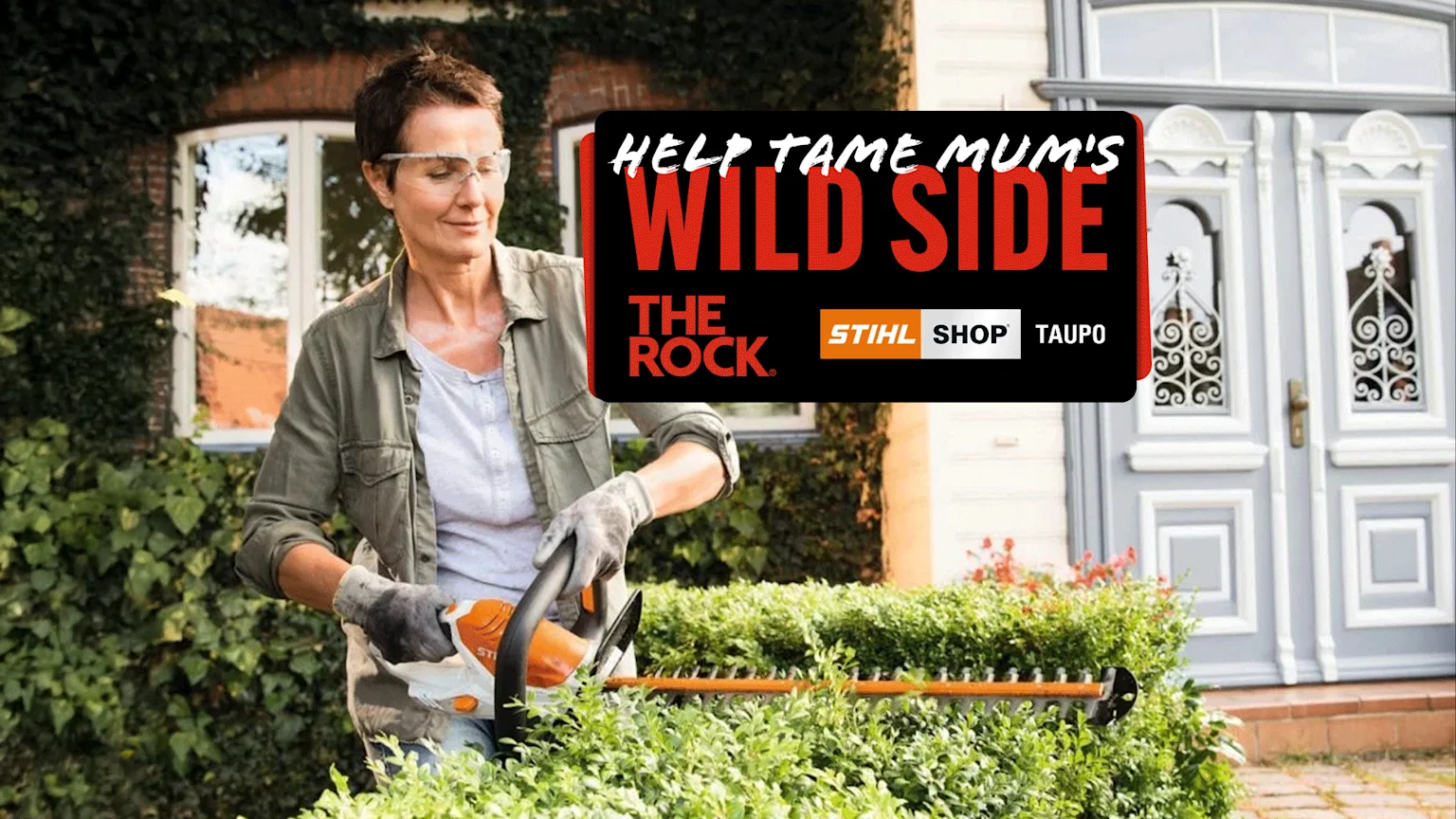 A woman in safety glasses and gloves uses an orange hedge trimmer to trim green hedges in front of a brick house with ivy and a grey door, overlaid with a STIHL SHOP TAUPO ad.