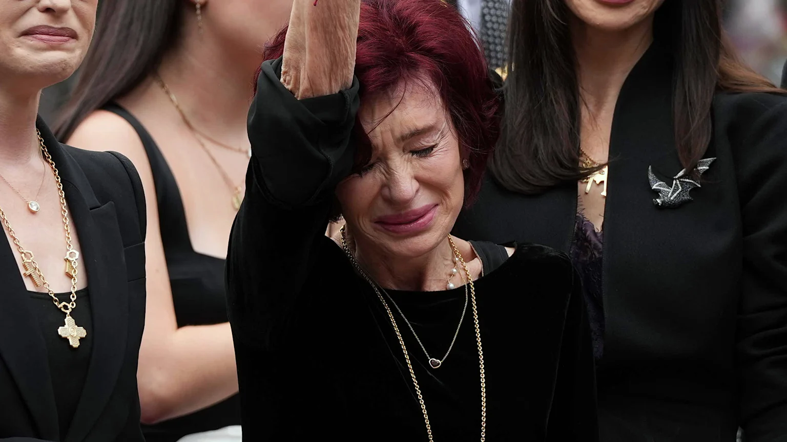 Sharon Osbourne at Ozzy Osbourne's funeral looking sad.