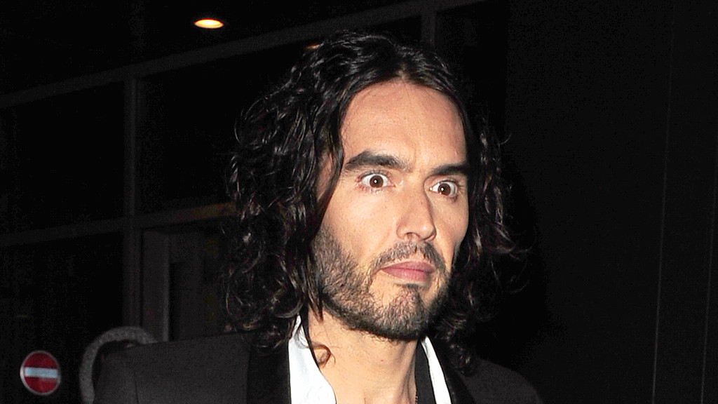 Russell Brand arrives at court for rape and sexual assault trial