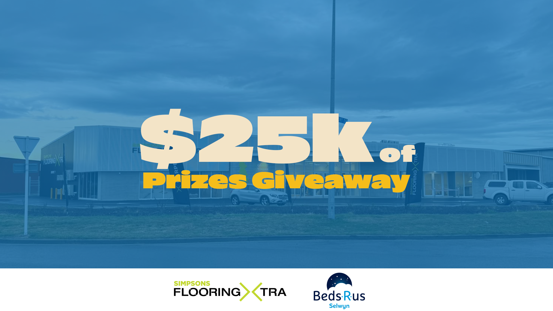 A blue-toned image of a retail building with large text "$25K of Prizes Giveaway" centrally placed, and logos for Simpsons Flooring XTRA and Beds R Us Selwyn at the bottom.