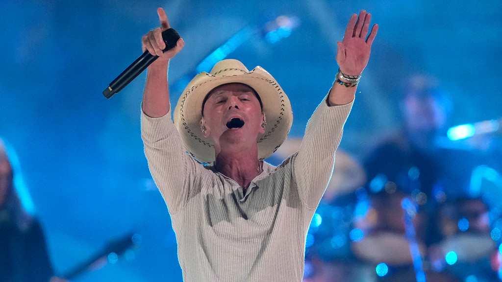 Kenny Chesney fan blocked from suing him over $300K scam