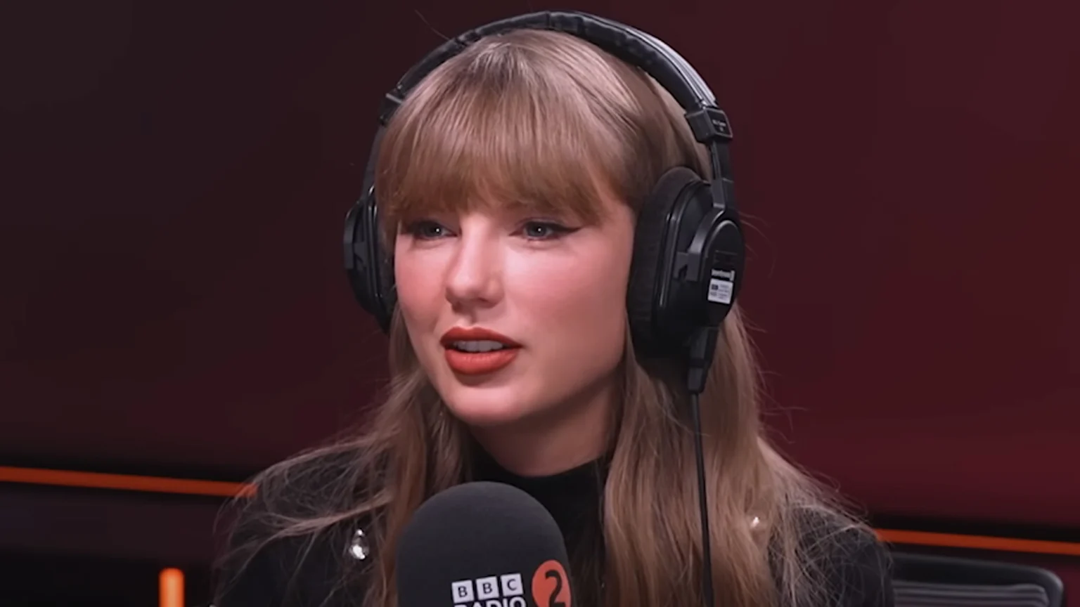 Taylor Swift addresses quitting music on BBC 2 Radio following 'The Life of a Showgirl' album release.