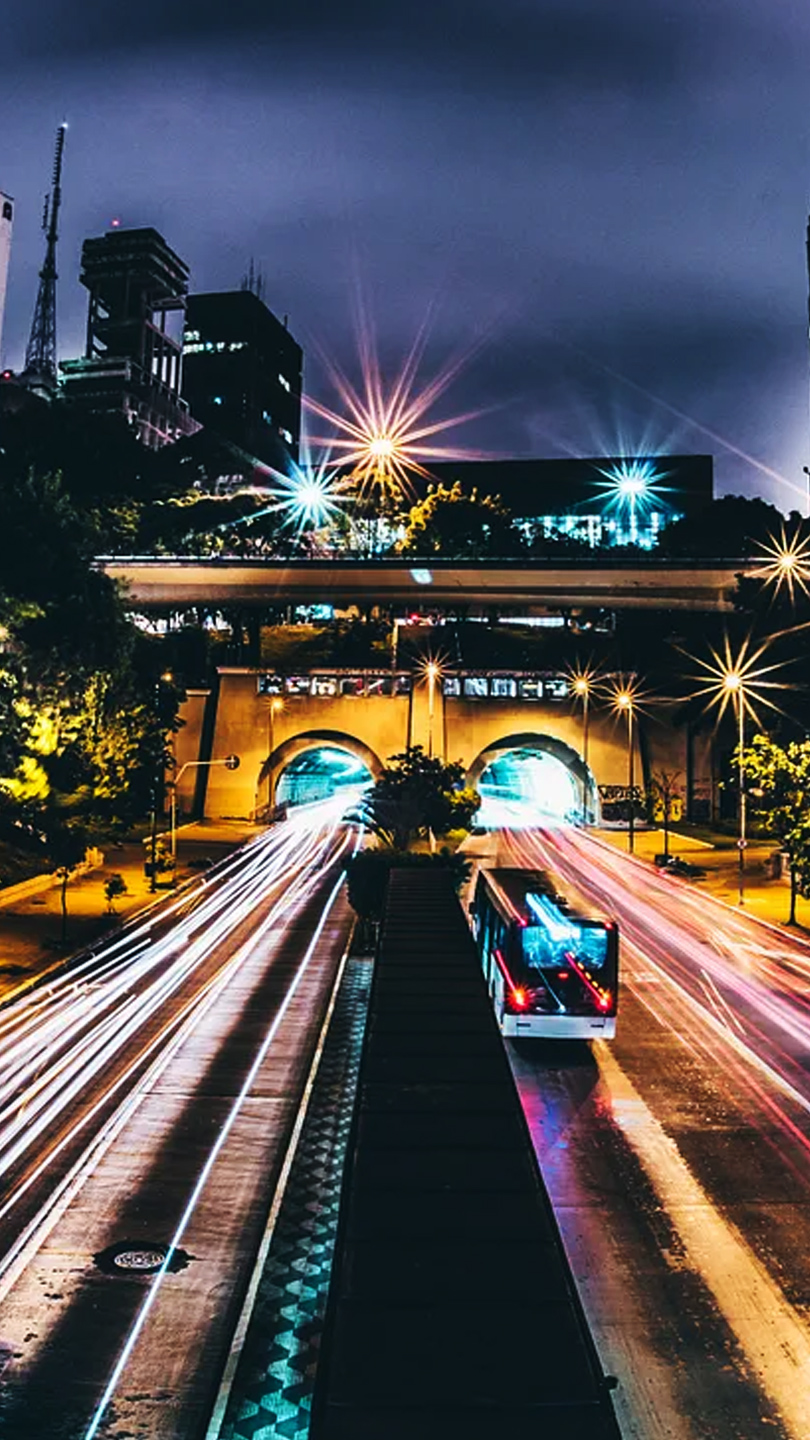City highway with light trails at night