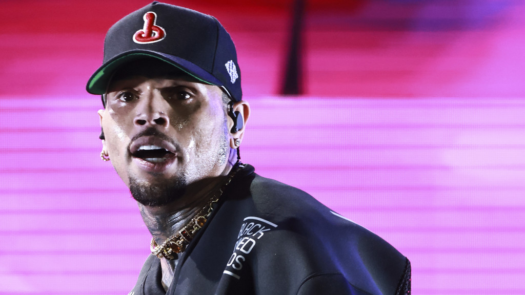 Chris Brown's housekeeper sobs during dog mauling trial