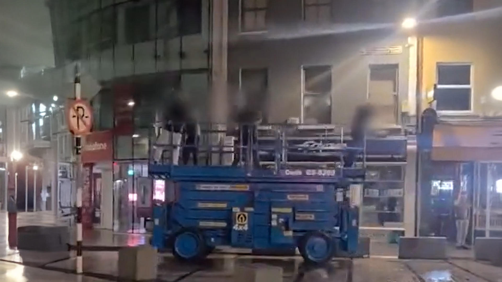 Four boys seen on top of a scissor lift in central Ireland. 