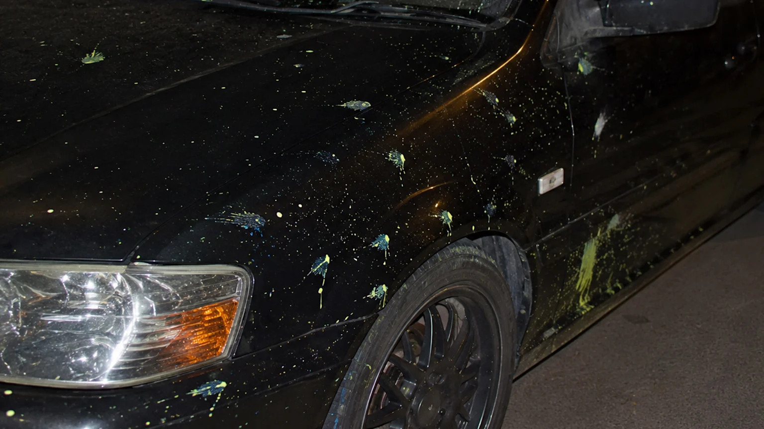 car covered in paintball paint