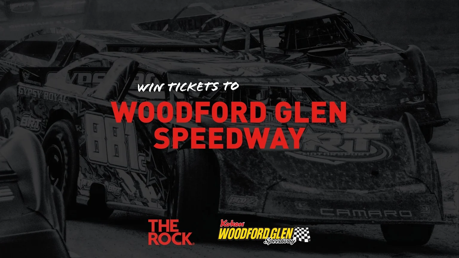 A dark, desaturated image of three muddy dirt race cars, with prominent text "WIN TICKETS TO WOODFORD GLEN SPEEDWAY" in white and red, alongside "THE ROCK" and "Koken Woodford Glen Speedway" logos.