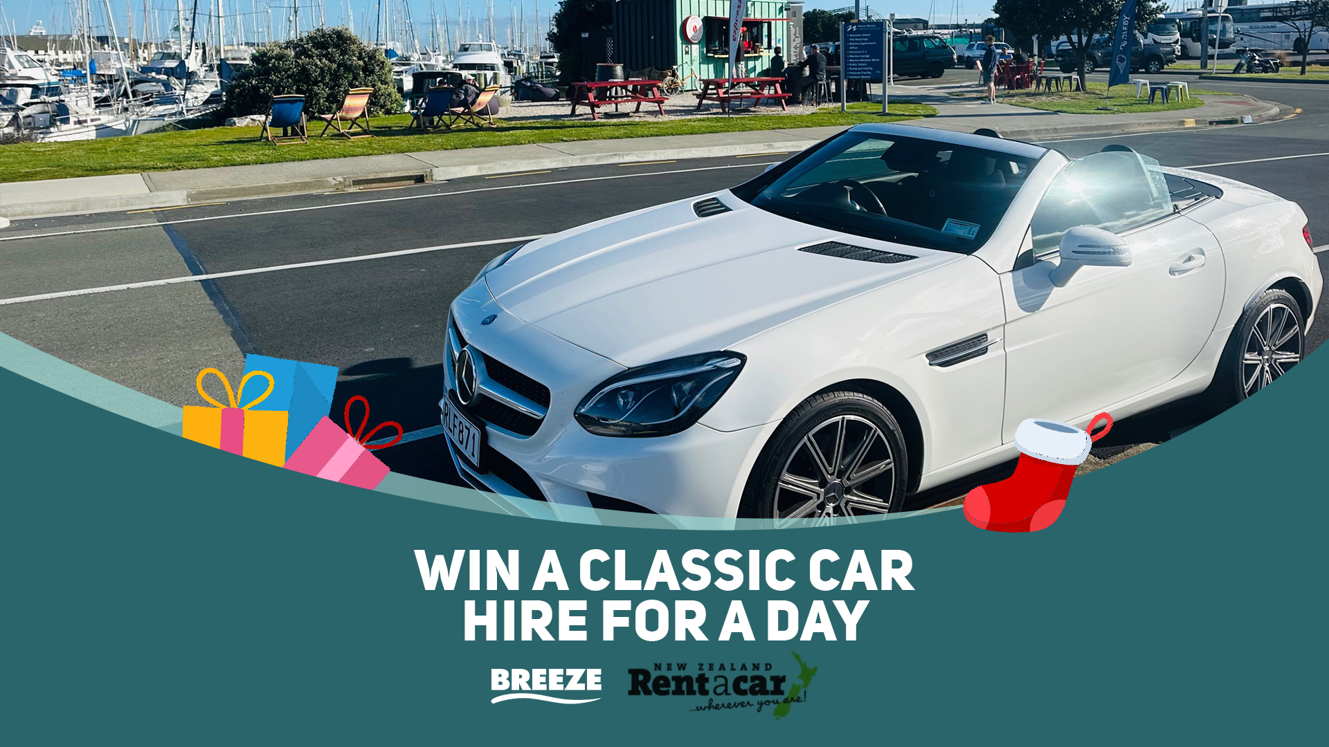 Red classic car with a wreath attached to the front. "Win a Classic Car Hire for a Day" with NZ Rent-a-Car