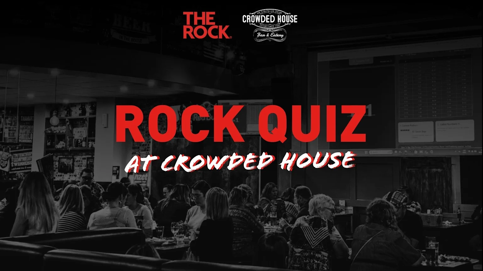 A grayscale bar scene with many people at tables, looking toward a screen displaying "ROCK QUIZ" in red and "AT CROWDED HOUSE" in white, also showing "THE ROCK" and "CROWDED HOUSE Bar & Eatery" logos.