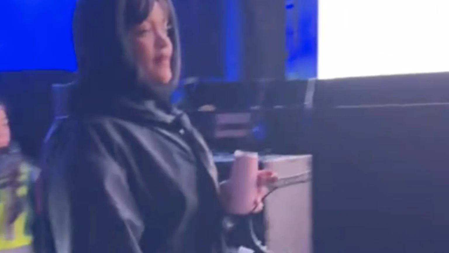 Rihanna holding a Huski champagne flute at a festival