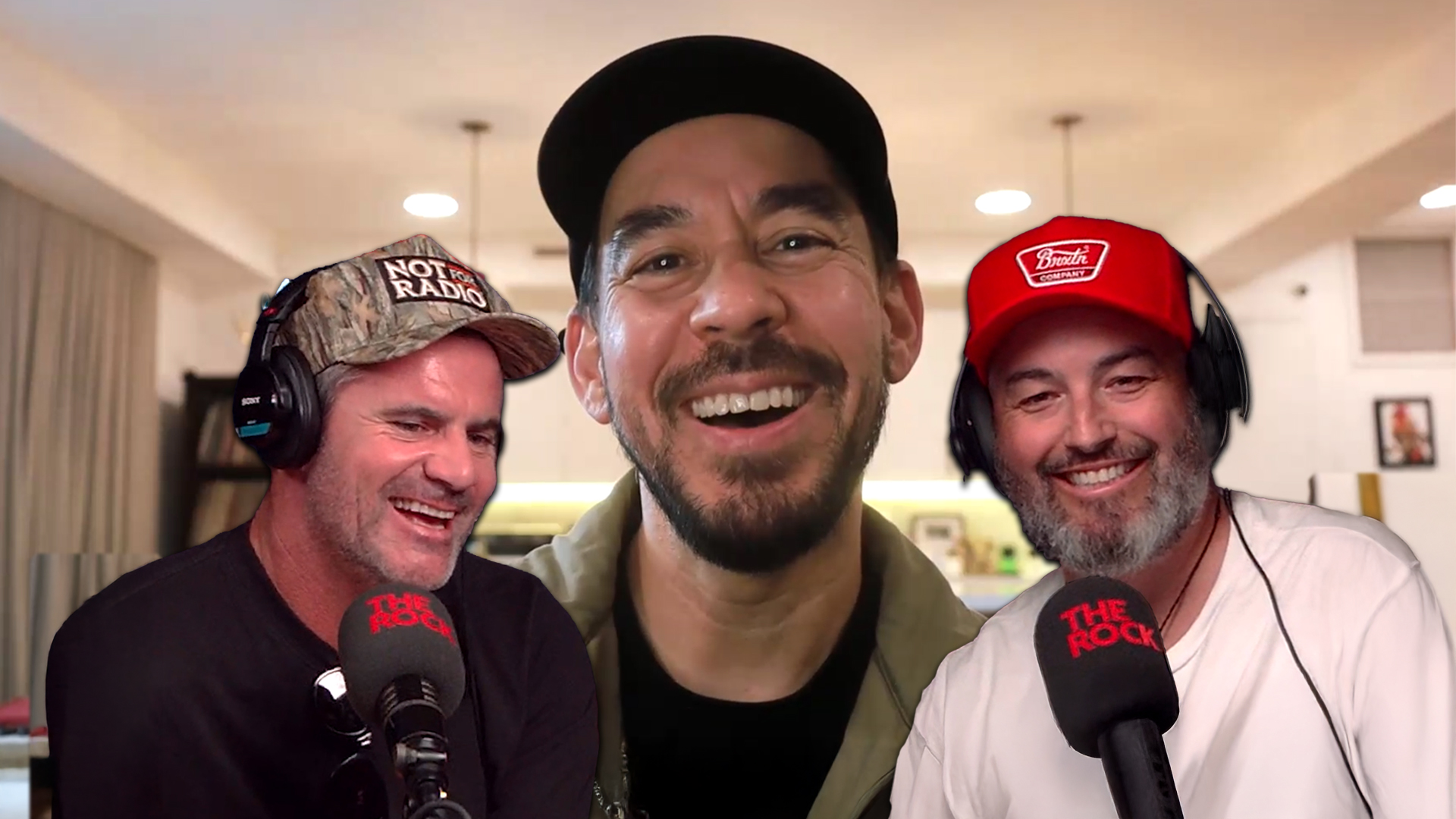 Mike Shinoda chatting with Rock Drive's Jay and Dunc either side of him. 