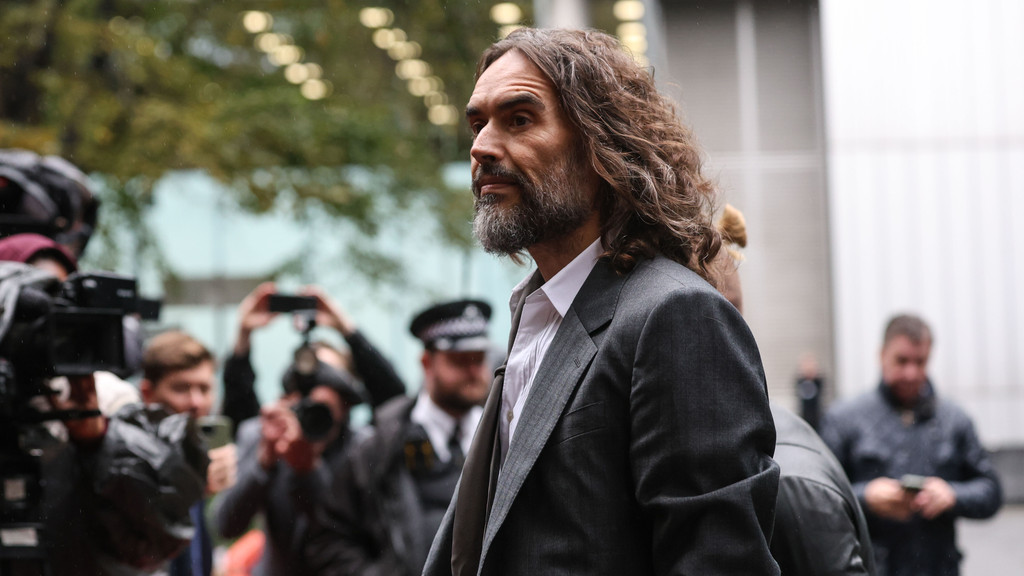 Russell Brand takes witness stand for first time in sexual assault trial