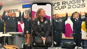 Black Fern player Amy Du Plessis sitting in the changing rooms looking upset watching teammates haka.