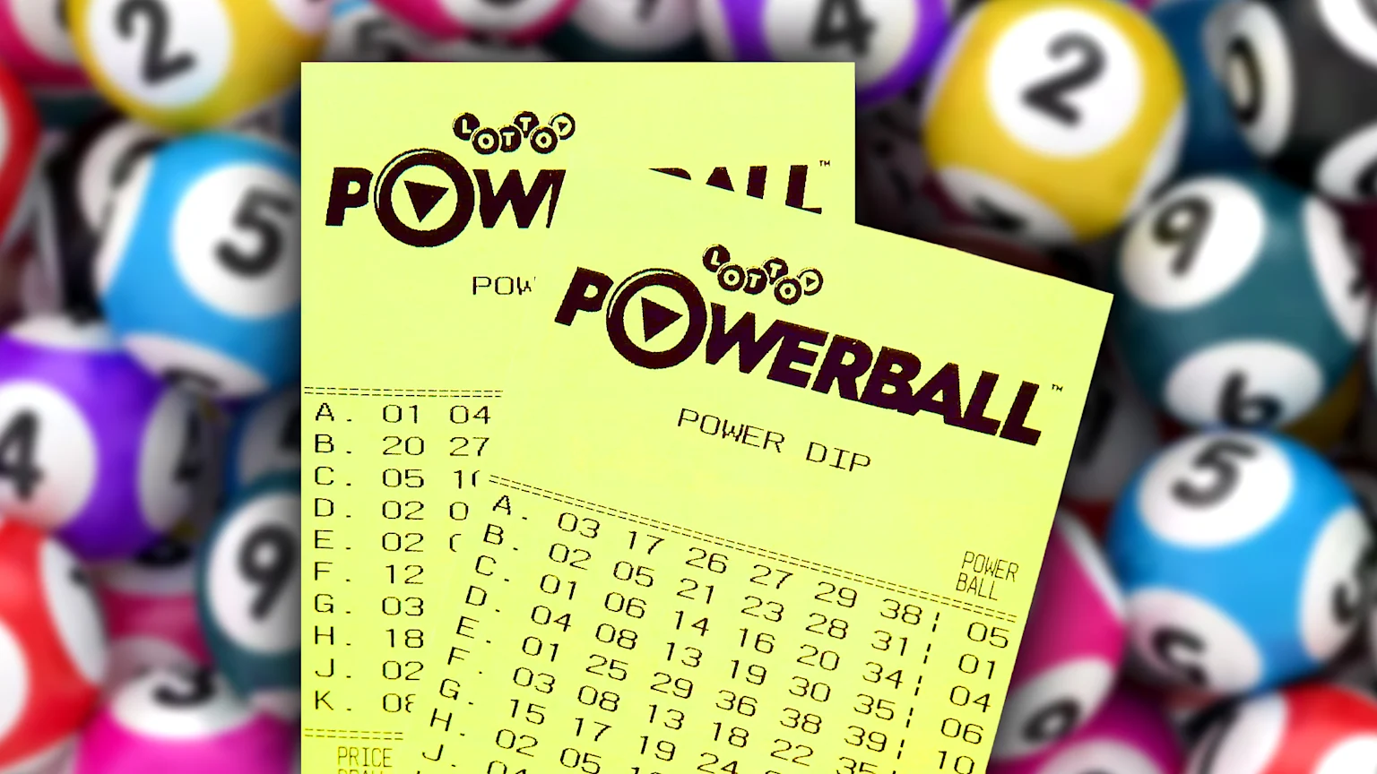 Two Powerball lottery tickets are shown on a blurred background of colorful lottery balls.