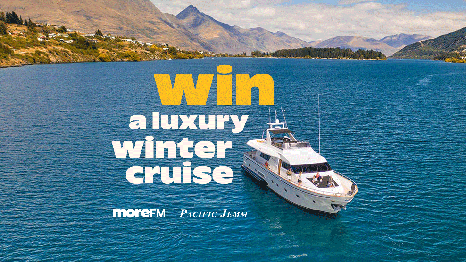 A luxury yacht cruises on clear blue water with mountains in the background, featuring prominent text "win a luxury winter cruise" and logos "moreFM" and "PACIFIC JEMM".