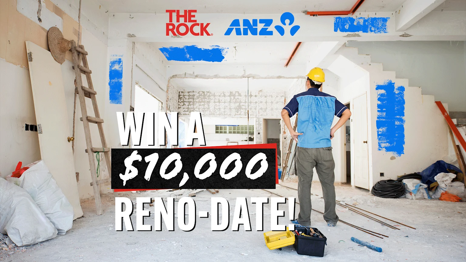 A man in a hard hat stands in a house under renovation, with "THE ROCK" and "ANZ" logos above, and large text "WIN A $10,000 RENO-DATE!" overlaying the scene.