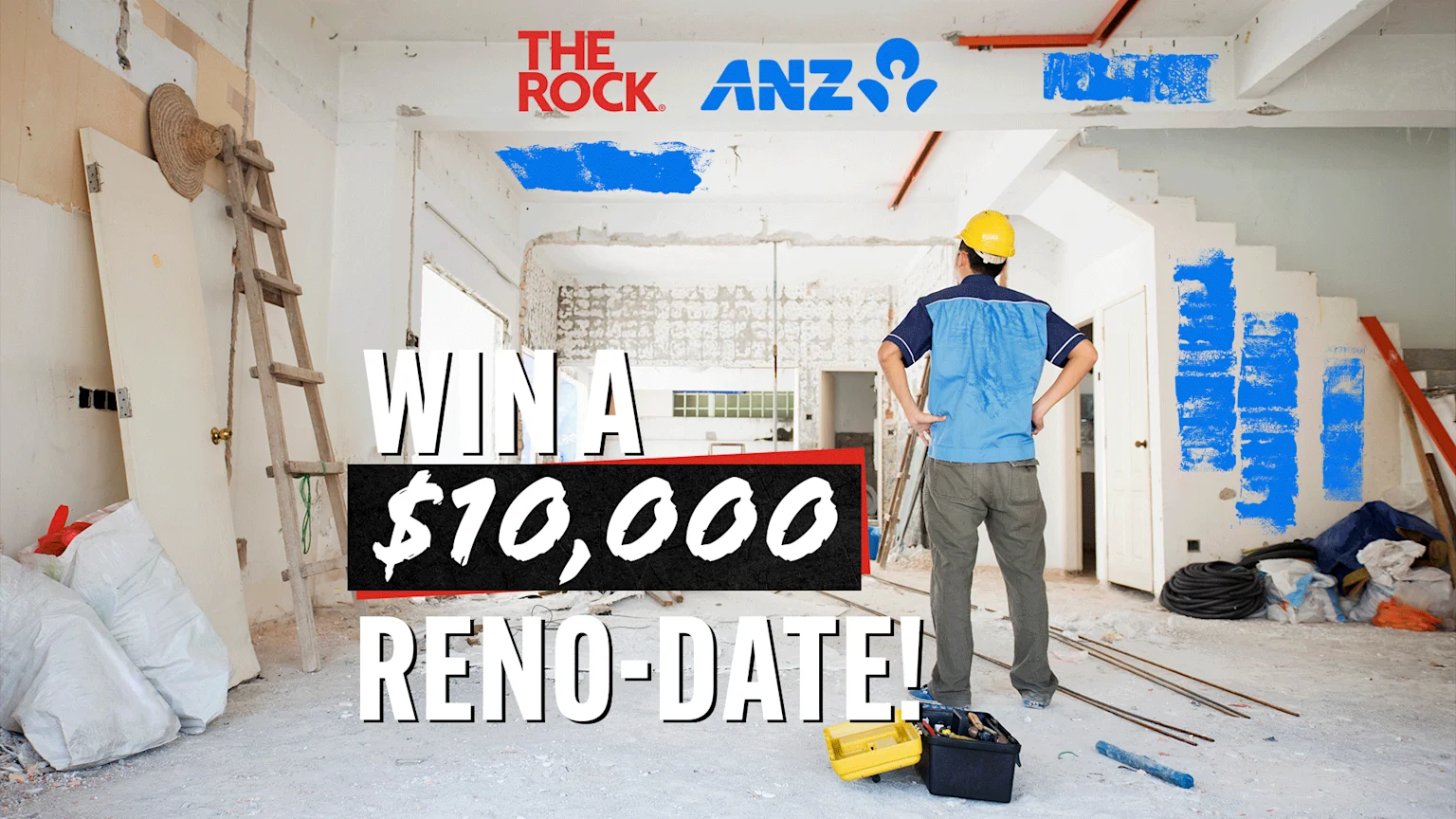 A man in a hard hat stands in a house under renovation, with "THE ROCK" and "ANZ" logos above, and large text "WIN A $10,000 RENO-DATE!" overlaying the scene.