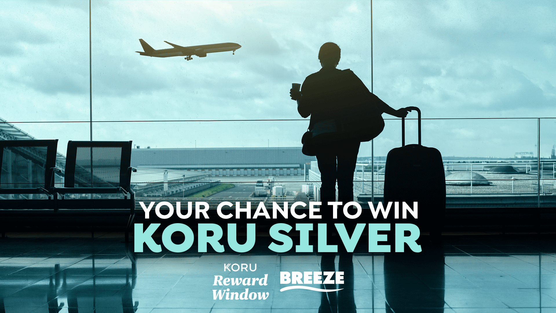 A person in silhouette stands by a large airport window with a suitcase, looking at an airplane, overlaid with text: "YOUR CHANCE TO WIN KORU SILVER" and related logos.