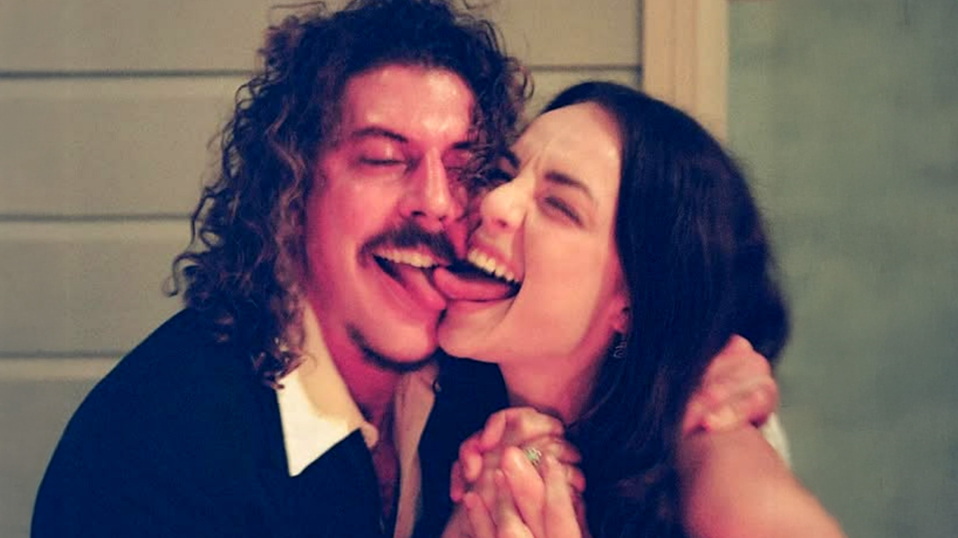 Adam Heyde (left) and Abbie Chatfield (right) touching tongues in a selfie.