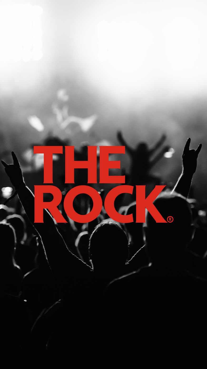 The Rock logo on top of a black and white image of a crowd at a rock concert