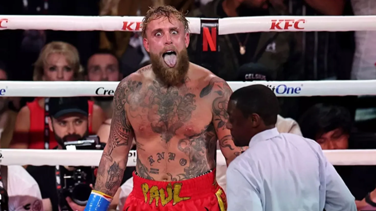 Jake Paul poking his tongue out during fight with Anthony Joshua.