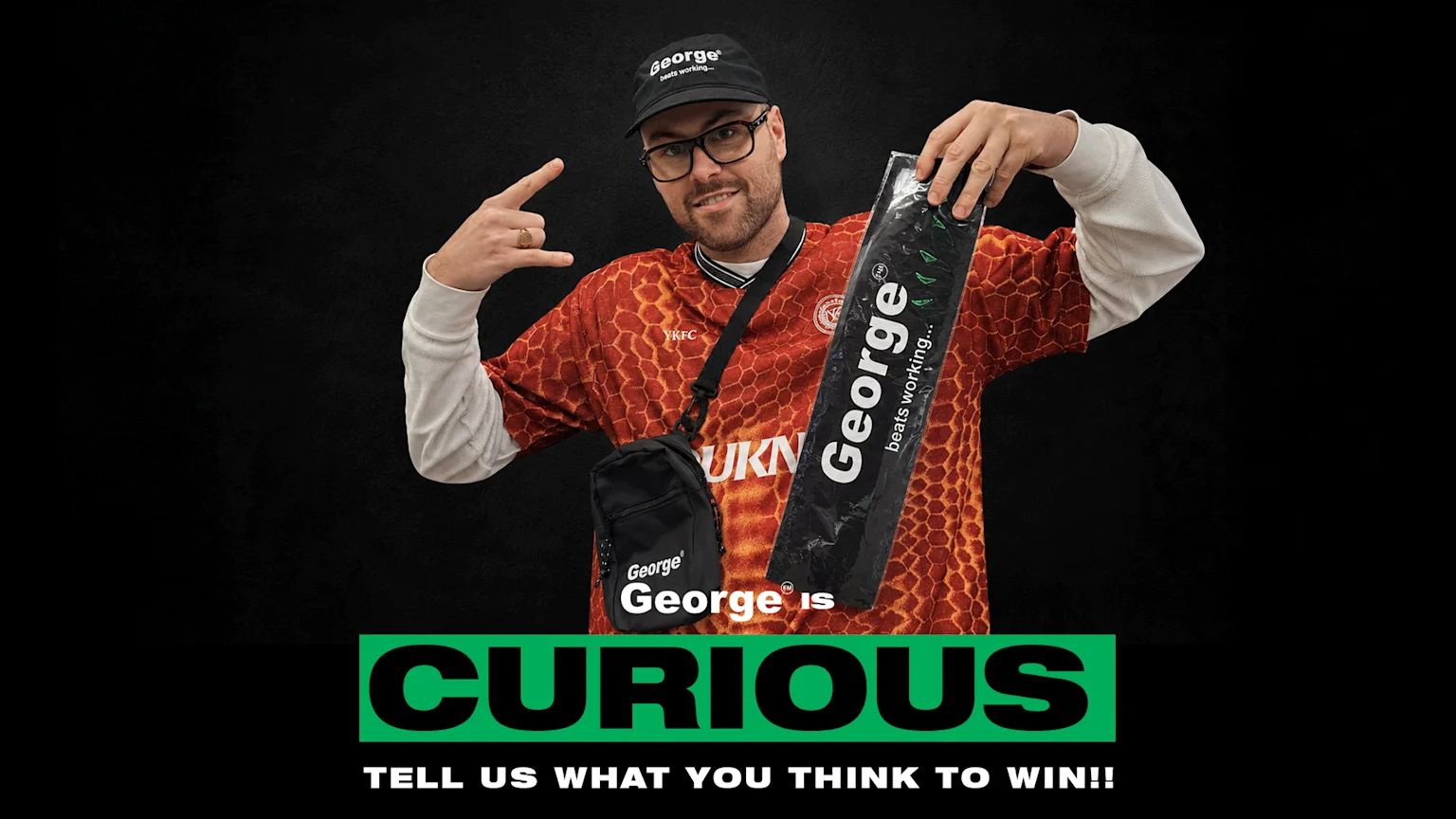 A man wearing a George branded cap and shirt, holding a George branded package, with large text reading "George is CURIOUS TELL US WHAT YOU THINK TO WIN!!" at the bottom.
