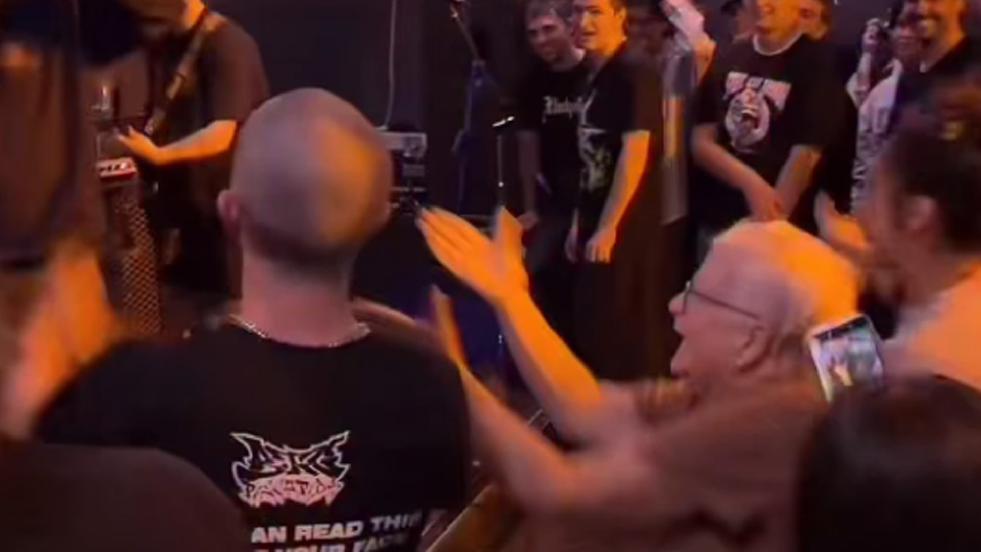 WATCH: Grandma protected by group of women after walking into metal mosh pit
