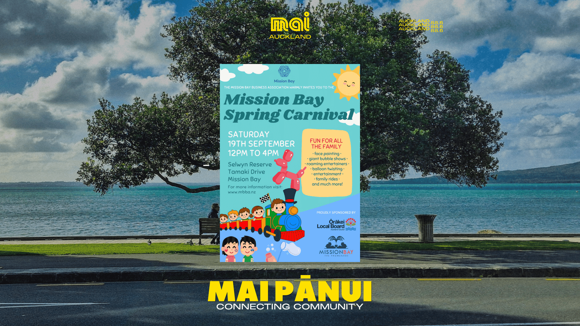 A large poster for the Mission Bay Spring Carnival, detailing the date (19th September) and family activities, stands in front of a scenic waterfront with green trees, blue sea, and a distant island.
