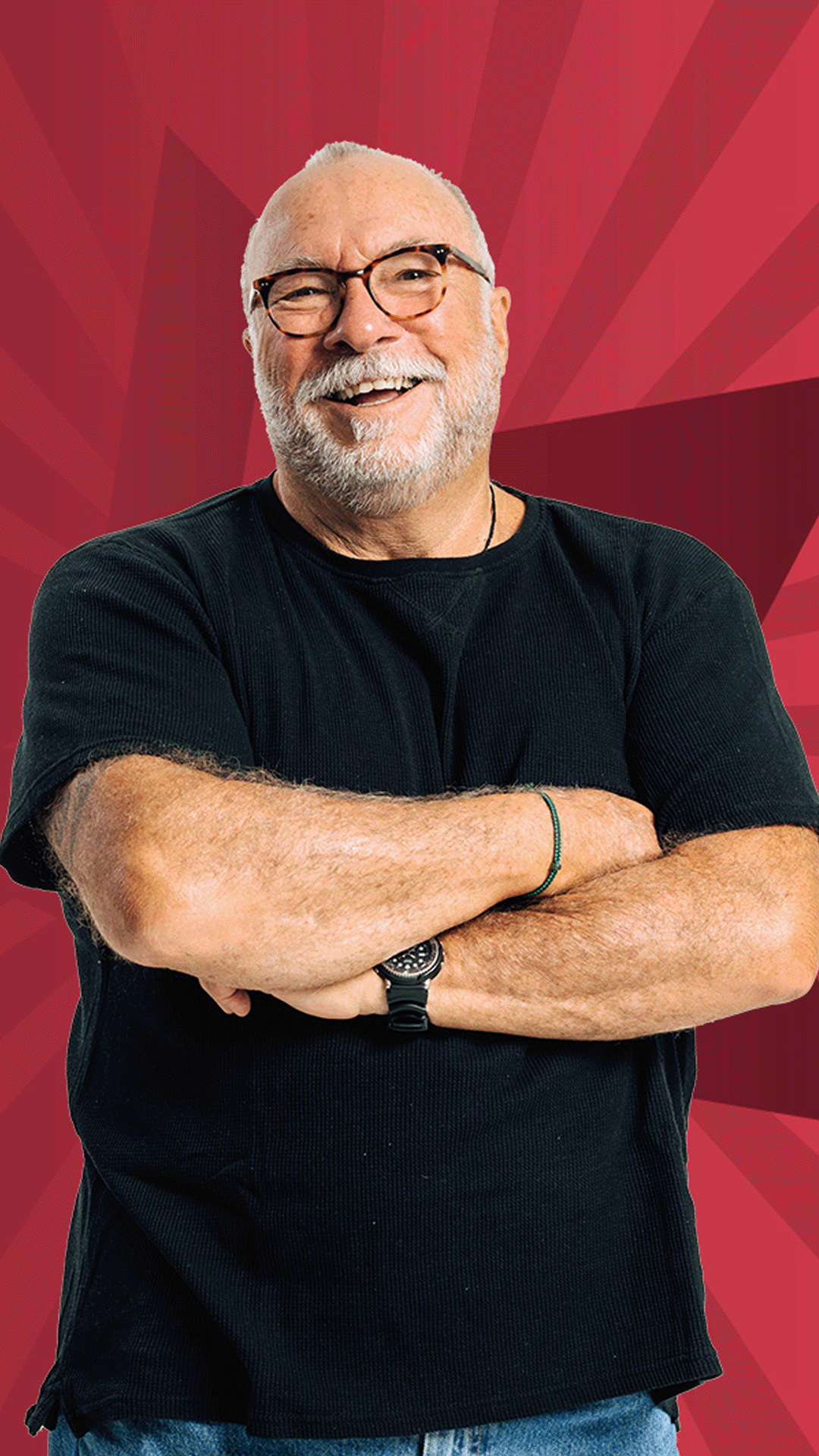 Bob Gentil smiling against a starry red background