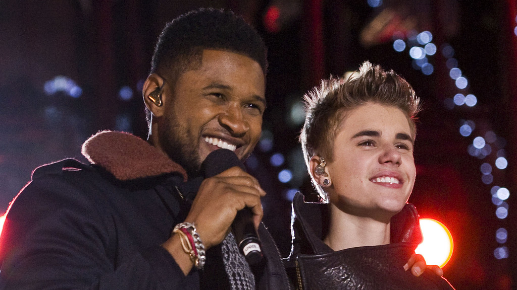 Usher ally denies 'heated exchange' with Justin Bieber at Oscars party