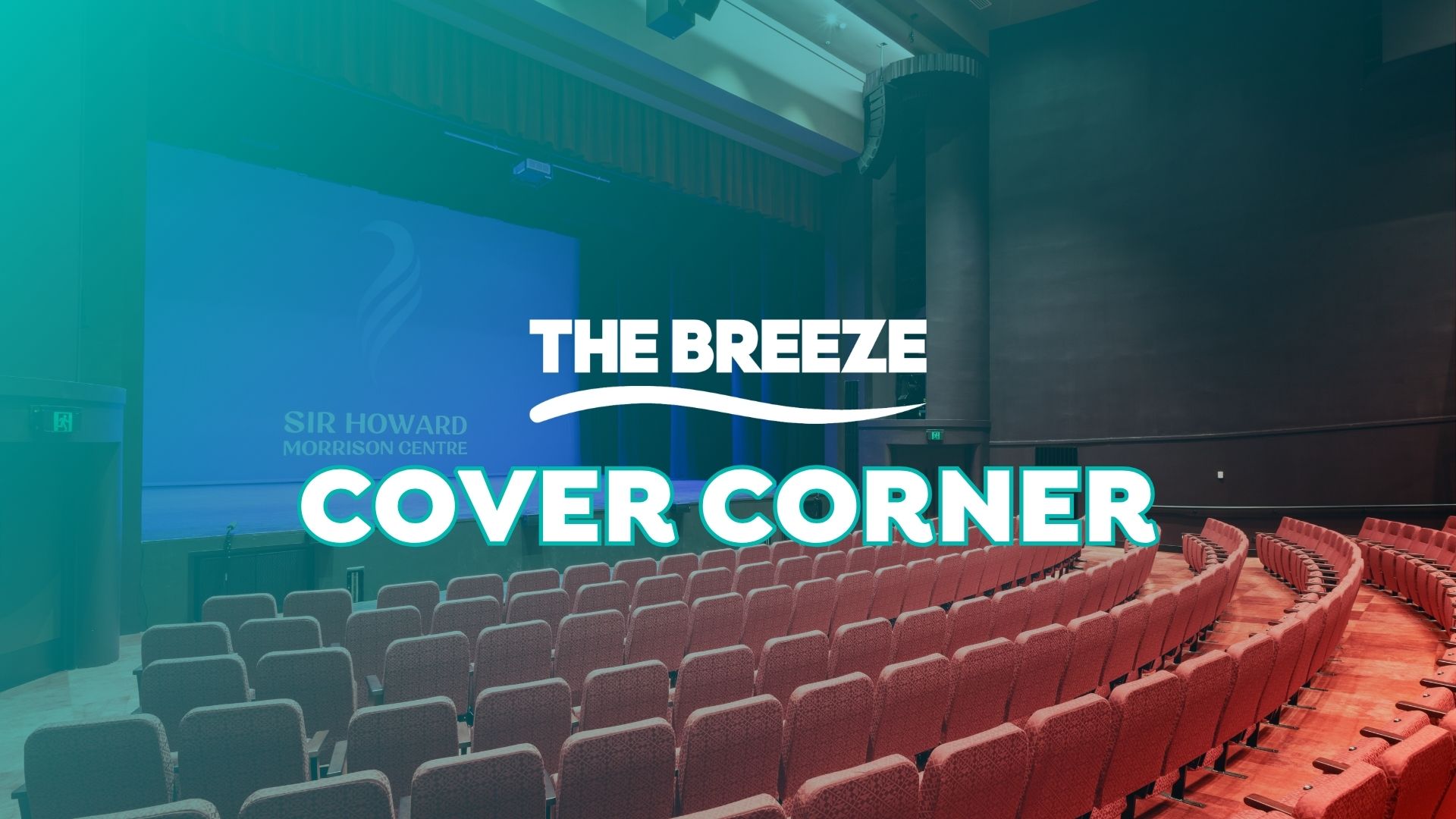 An empty auditorium with rows of reddish-brown seats facing a stage with a blue screen displaying "SIR HOWARD MORRISON CENTRE" and a logo, overlaid with text "THE BREEZE COVER CORNER".