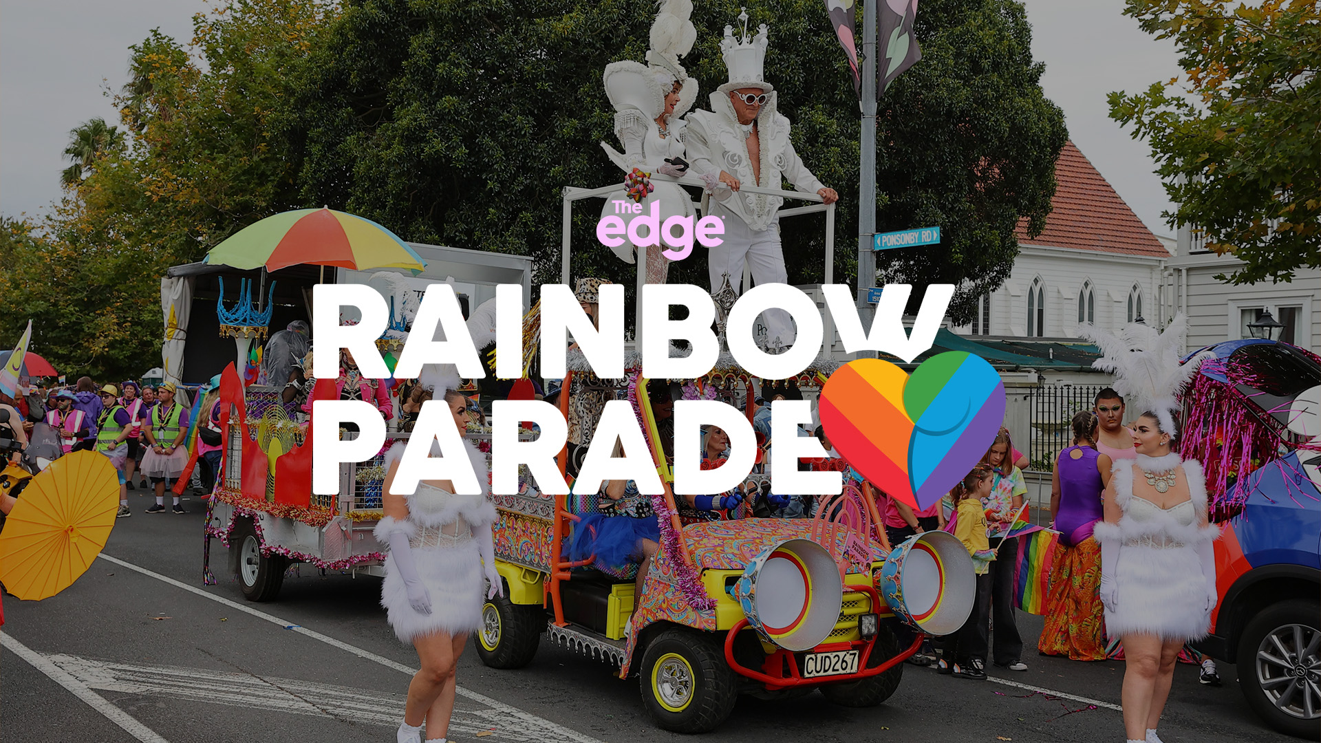 Auckland Rainbow Parade float with logo & The Edge