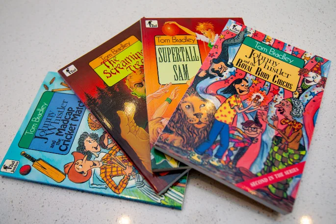 Pile of four children's books written by Tom Bradley
