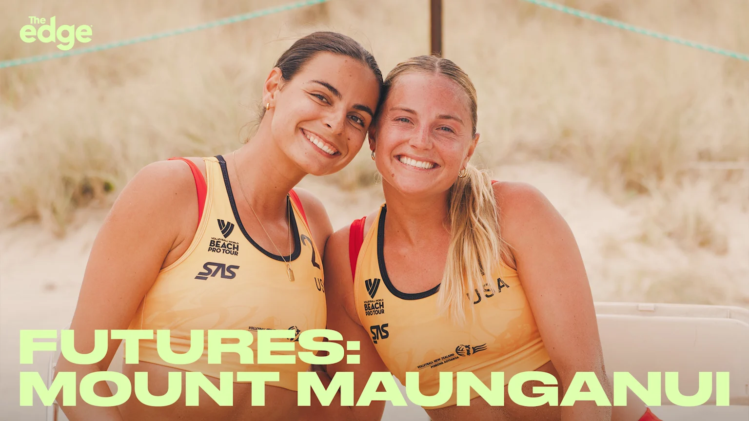 Two volleyballers smiling at the camera. "Futures: Mount Maunganui" with The Edge