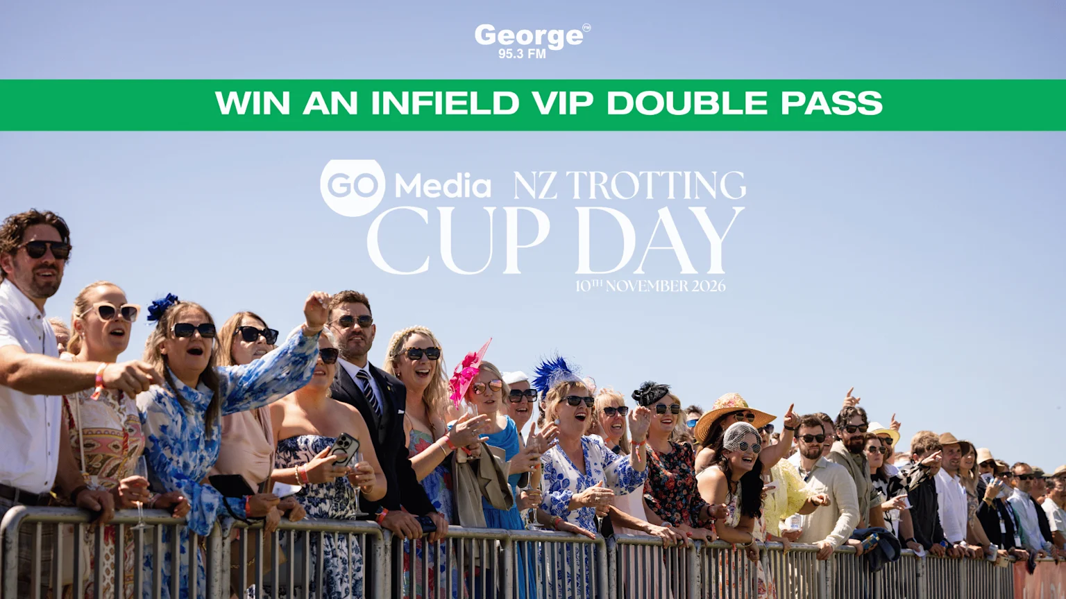 A diverse crowd excitedly watches an event at NZ Trotting Cup Day, with "WIN AN INFIELD VIP DOUBLE PASS" and "George 95.3 FM" visible.