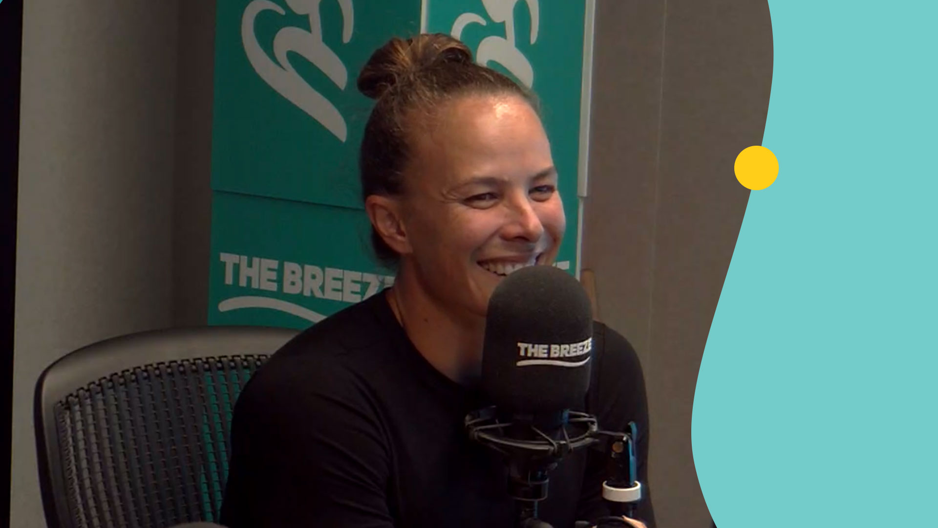 Lisa Carrington sitting in the breeze studio