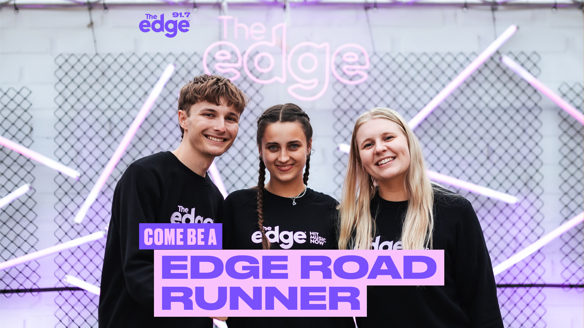 Three young adults in their 20s wear black shirts with 'The edge' branding, smiling and posing in front of a white brick wall and black mesh fence with pink neon lights. Promotional texts encourage becoming an Edge Road Runner.