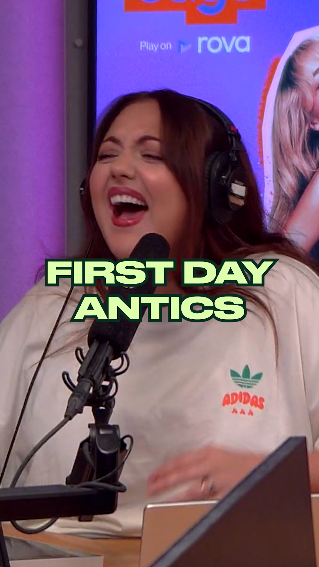 Woman laughing in radio studio with headphones