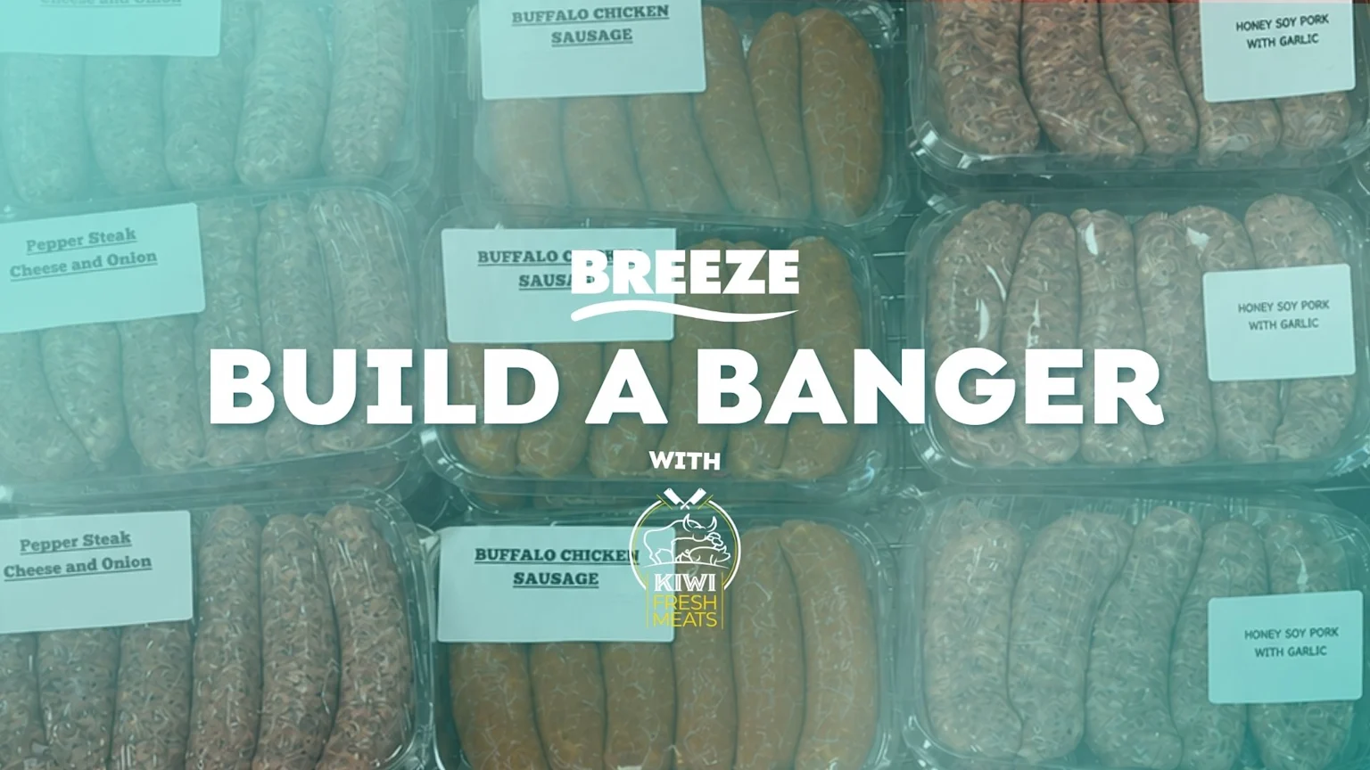 A display of packaged sausages with labels like 'Pepper Steak' and 'Buffalo Chicken', overlaid with the text 'BREEZE BUILD A BANGER WITH' and the Kiwi Fresh Meats logo.