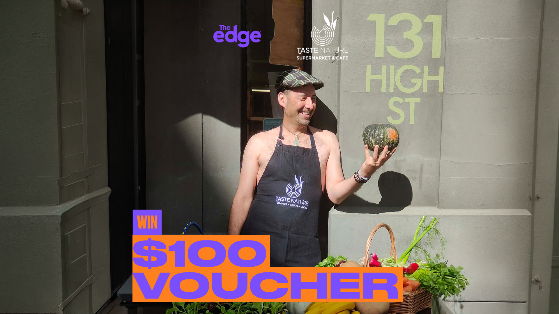 A man in a cap and apron smiles holding a pumpkin, next to a basket of produce, with "The edge" and "Taste Nature Supermarket & Cafe" logos, and an overlay "WIN $100 VOUCHER."