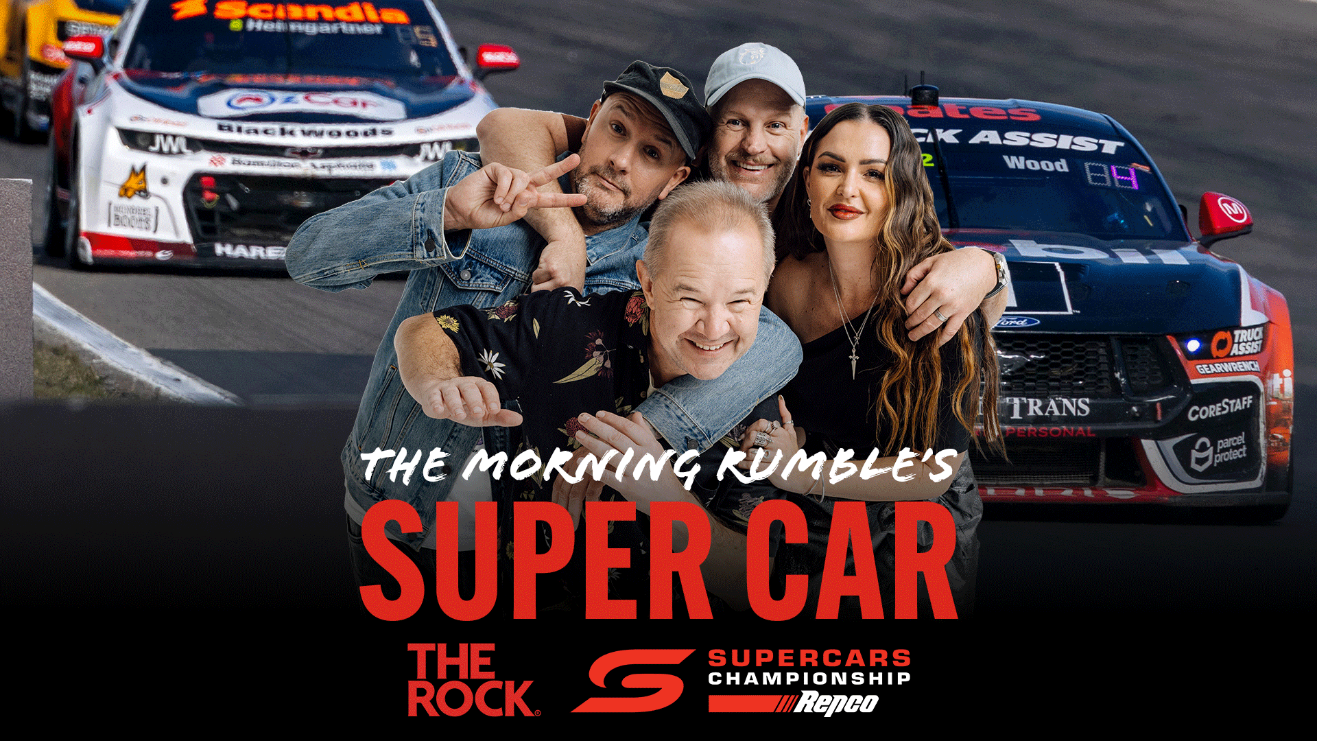 Four smiling people pose casually in front of two Supercars racing on a track, with text "THE MORNING RUMBLE'S SUPER CAR" and "SUPERCARS CHAMPIONSHIP".