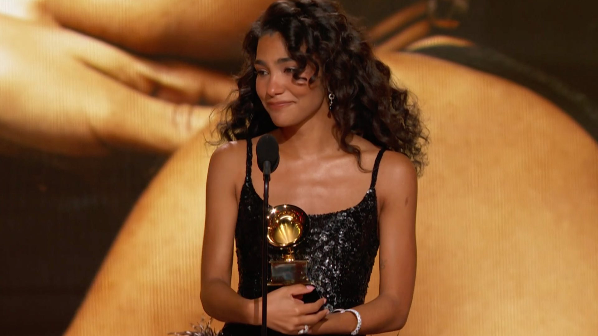 Grammys 2026: Olivia Dean tearfully celebrates immigrant background in first win